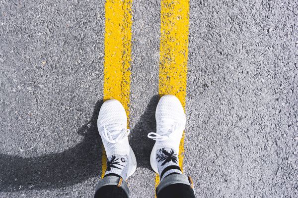 Yellow Lines and White Trainers
